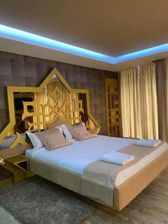 Imagen de la habitación del Hotel New W, Tirana. Foto 13
