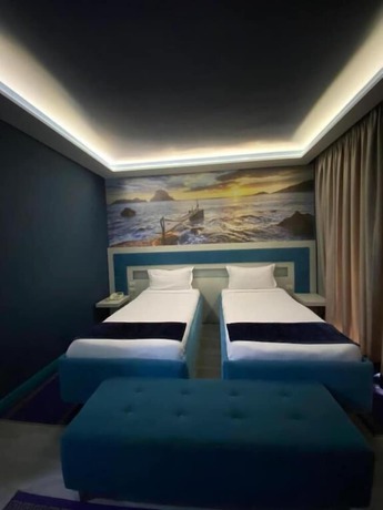 Imagen de la habitación del Hotel New W, Tirana. Foto 16