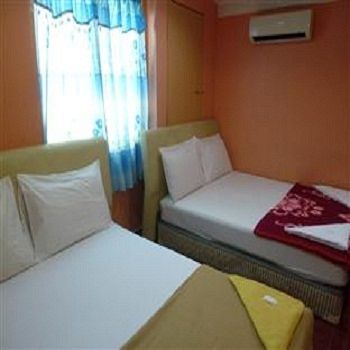 Imagen de la habitación del Hotel New Wave Medan. Foto 6