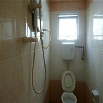 Imagen de la habitación del Hotel New Wave Medan. Foto 7