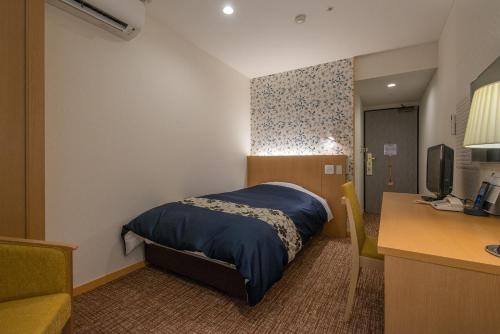 Imagen de la habitación del Hotel New Welcity Yugawara. Foto 7