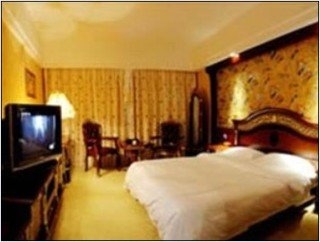 Imagen de la habitación del Hotel New West Street International. Foto 8