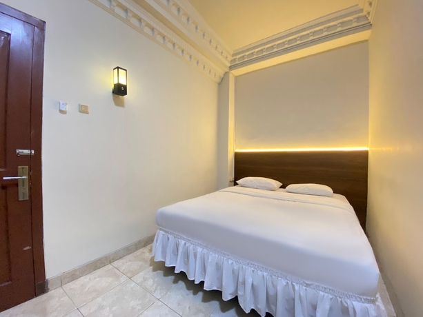 Imagen de la habitación del Hotel New Wijaya. Foto 4