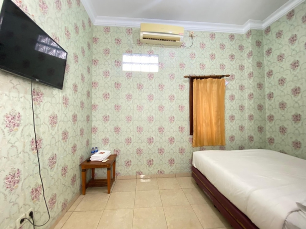 Imagen de la habitación del Hotel New Wijaya. Foto 9