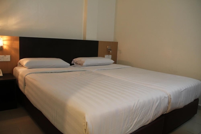 Imagen de la habitación del Hotel New Winner. Foto 5