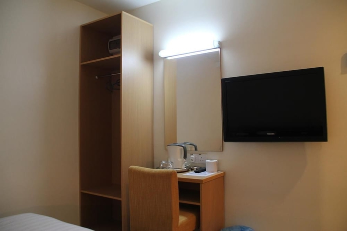 Imagen de la habitación del Hotel New Winner. Foto 7