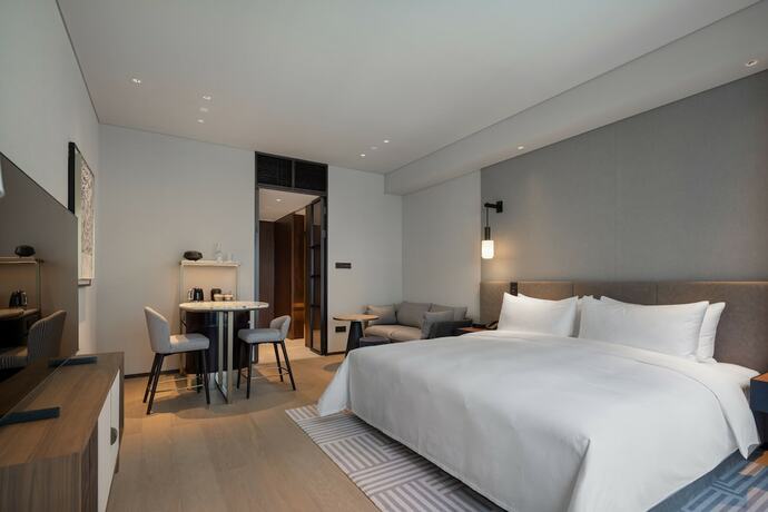 Imagen de la habitación del Hotel New World Guangzhou. Foto 11