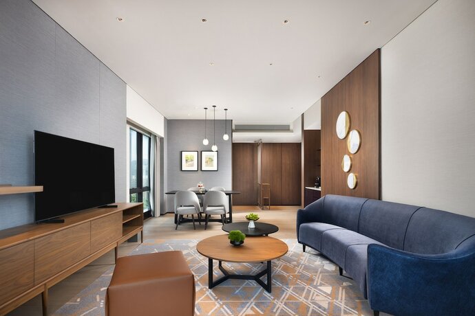 Imagen de la habitación del Hotel New World Guangzhou. Foto 12