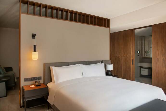 Imagen de la habitación del Hotel New World Guangzhou. Foto 13