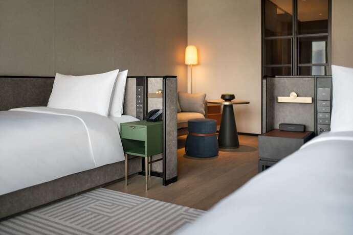 Imagen de la habitación del Hotel New World Guangzhou. Foto 14