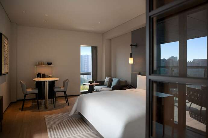 Imagen de la habitación del Hotel New World Guangzhou. Foto 18