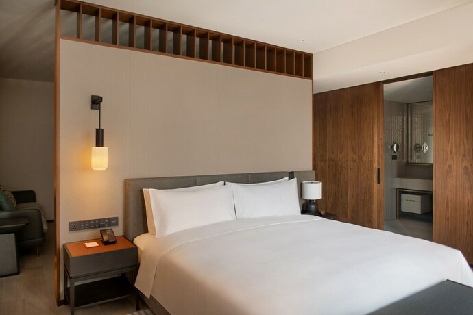 Imagen de la habitación del Hotel New World Guangzhou. Foto 20