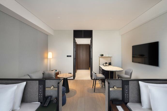 Imagen de la habitación del Hotel New World Guangzhou. Foto 21