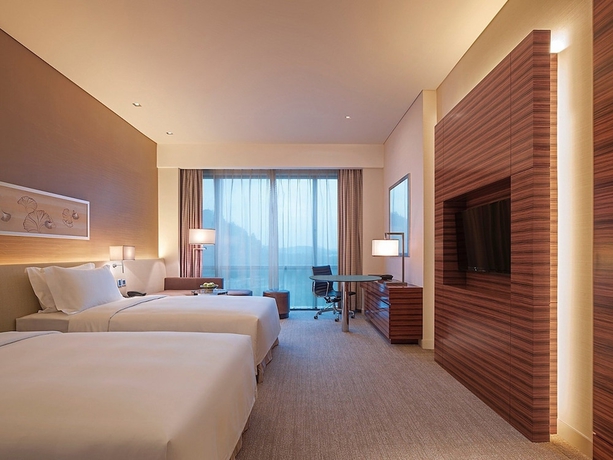 Imagen de la habitación del Hotel New World Guiyang Hotel. Foto 2