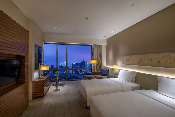 Imagen de la habitación del Hotel New World Guiyang Hotel. Foto 3
