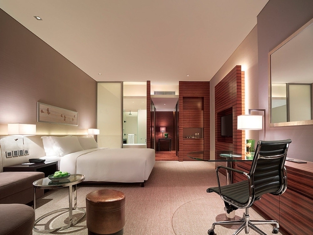 Imagen de la habitación del Hotel New World Guiyang Hotel. Foto 5