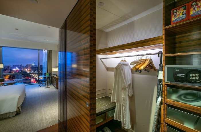 Imagen de la habitación del Hotel New World Guiyang Hotel. Foto 6