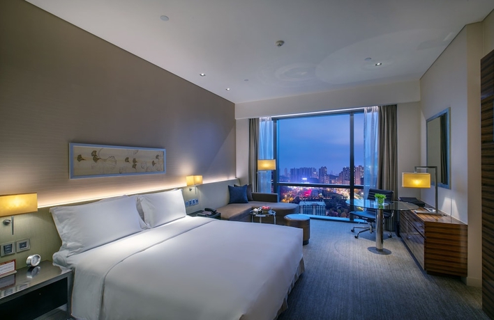 Imagen de la habitación del Hotel New World Guiyang Hotel. Foto 7