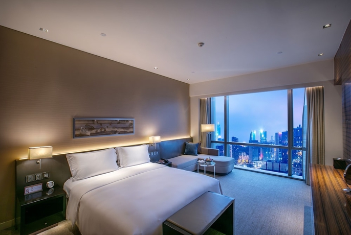 Imagen de la habitación del Hotel New World Guiyang Hotel. Foto 9