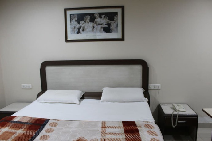 Imagen de la habitación del Hotel New World, Kambohpura. Foto 3