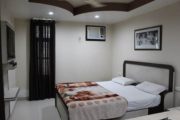 Imagen de la habitación del Hotel New World, Kambohpura. Foto 5
