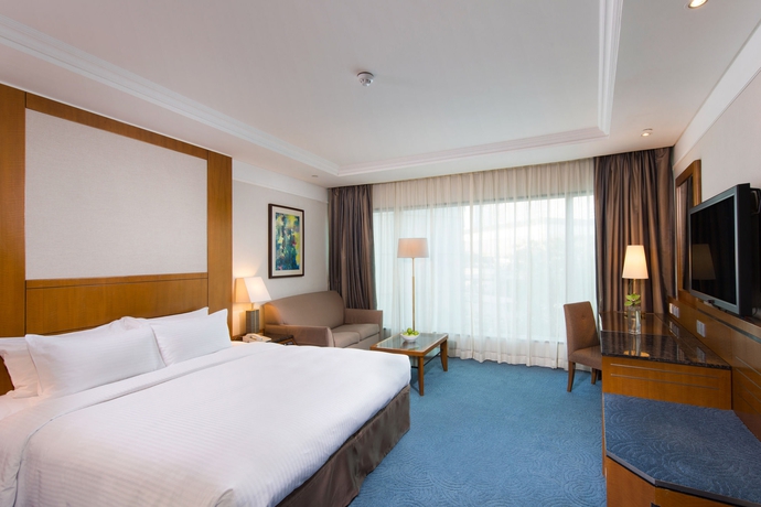 Imagen de la habitación del Hotel New World Millennium Hong Kong. Foto 11