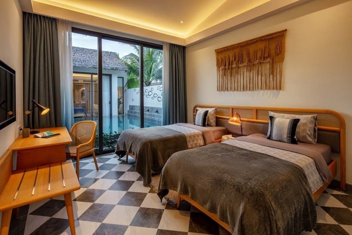 Imagen de la habitación del Hotel New World Phu Quoc Resort. Foto 4