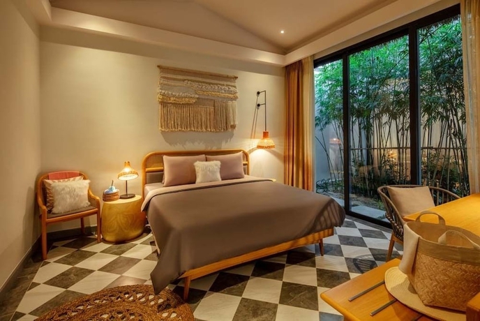 Imagen de la habitación del Hotel New World Phu Quoc Resort. Foto 6