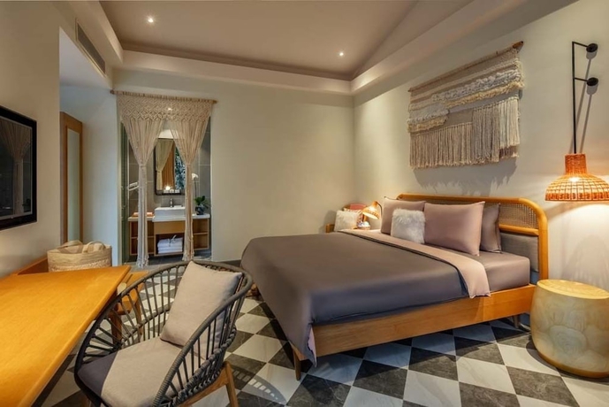 Imagen de la habitación del Hotel New World Phu Quoc Resort. Foto 7