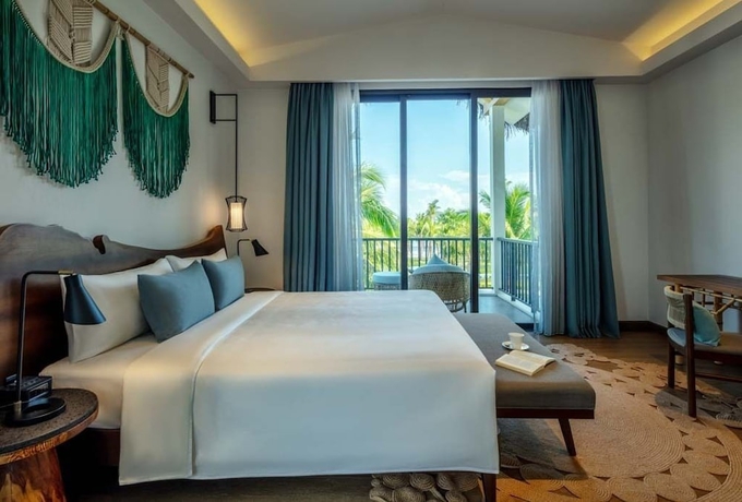 Imagen de la habitación del Hotel New World Phu Quoc Resort. Foto 10