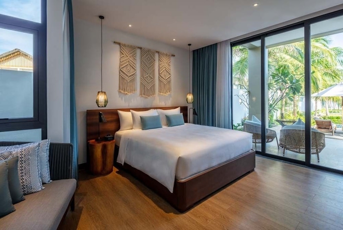 Imagen de la habitación del Hotel New World Phu Quoc Resort. Foto 11