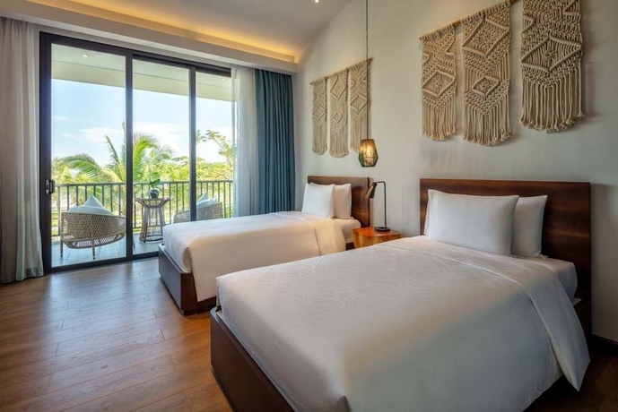 Imagen de la habitación del Hotel New World Phu Quoc Resort. Foto 12