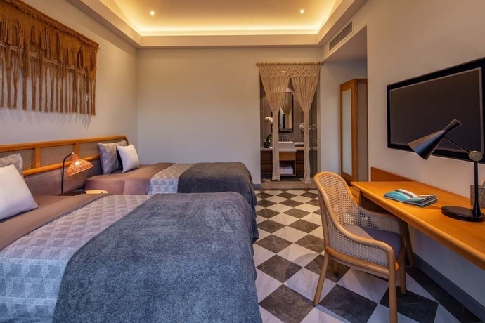 Imagen de la habitación del Hotel New World Phu Quoc Resort. Foto 17