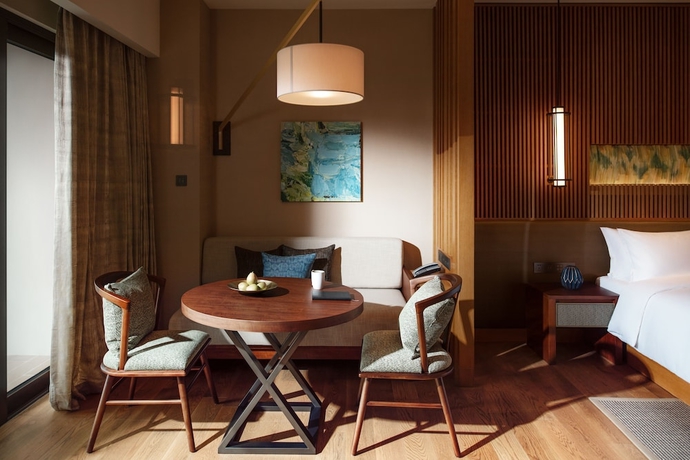 Imagen de la habitación del Hotel New World Qingyuan. Foto 3