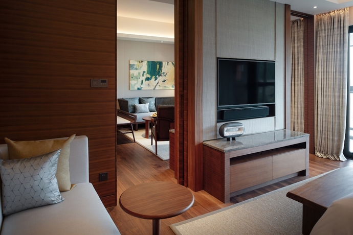 Imagen de la habitación del Hotel New World Qingyuan. Foto 13