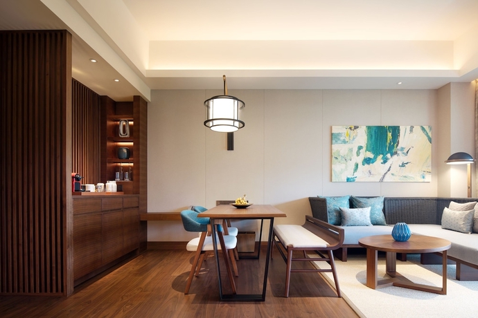 Imagen de la habitación del Hotel New World Qingyuan. Foto 17