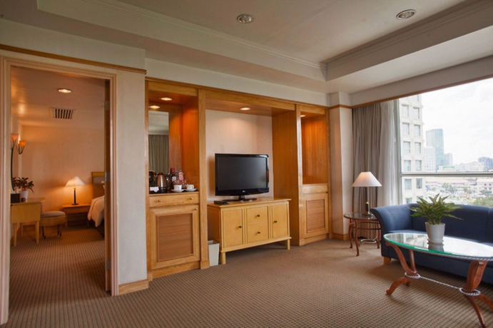 Imagen de la habitación del Hotel New World Saigon. Foto 11