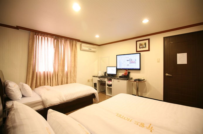 Imagen de la habitación del Hotel New World, Seul. Foto 6