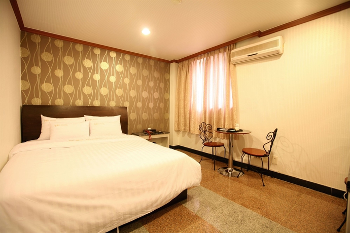 Imagen de la habitación del Hotel New World, Seul. Foto 7