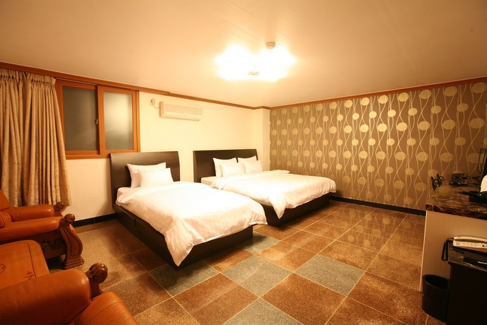 Imagen de la habitación del Hotel New World, Seul. Foto 8