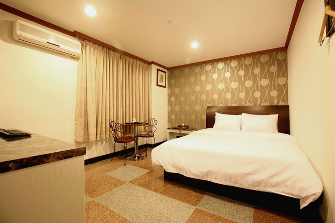 Imagen de la habitación del Hotel New World, Seul. Foto 10