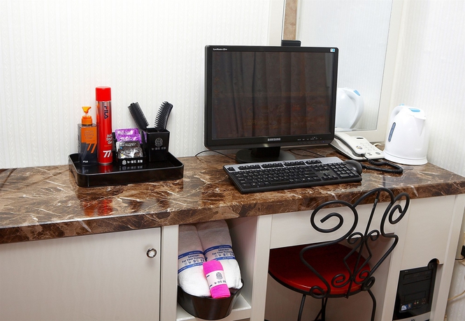 Imagen de la habitación del Hotel New World, Seul. Foto 16