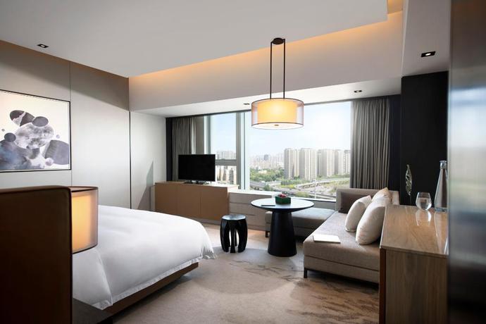 Imagen de la habitación del Hotel New World Shenyang Hotel. Foto 13