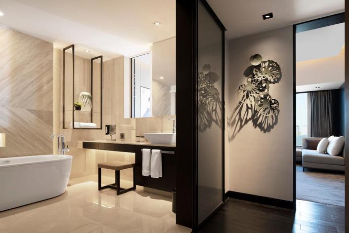 Imagen de la habitación del Hotel New World Shenyang Hotel. Foto 15