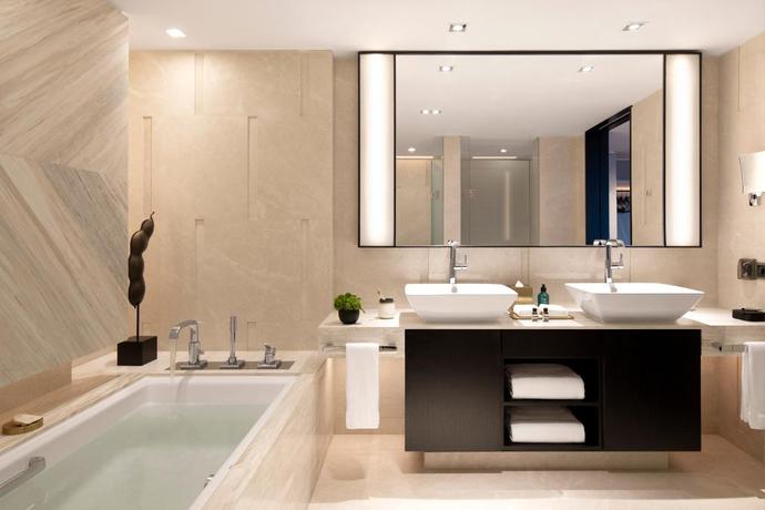 Imagen de la habitación del Hotel New World Shenyang Hotel. Foto 19