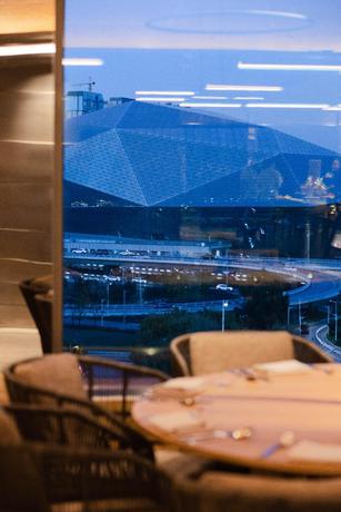 Imagen del bar/restaurante del Hotel New World Shenyang Hotel. Foto 5