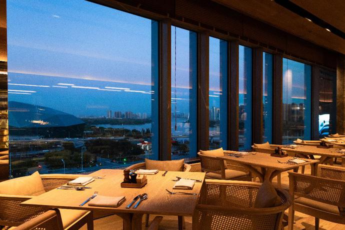 Imagen del bar/restaurante del Hotel New World Shenyang Hotel. Foto 6