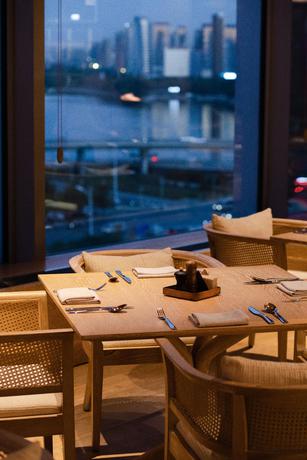 Imagen del bar/restaurante del Hotel New World Shenyang Hotel. Foto 8