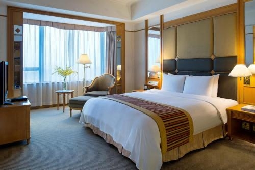 Imagen de la habitación del Hotel New World Shunde. Foto 5