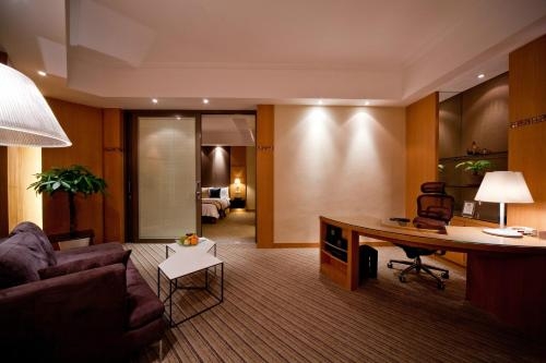 Imagen de la habitación del Hotel New World Shunde. Foto 8